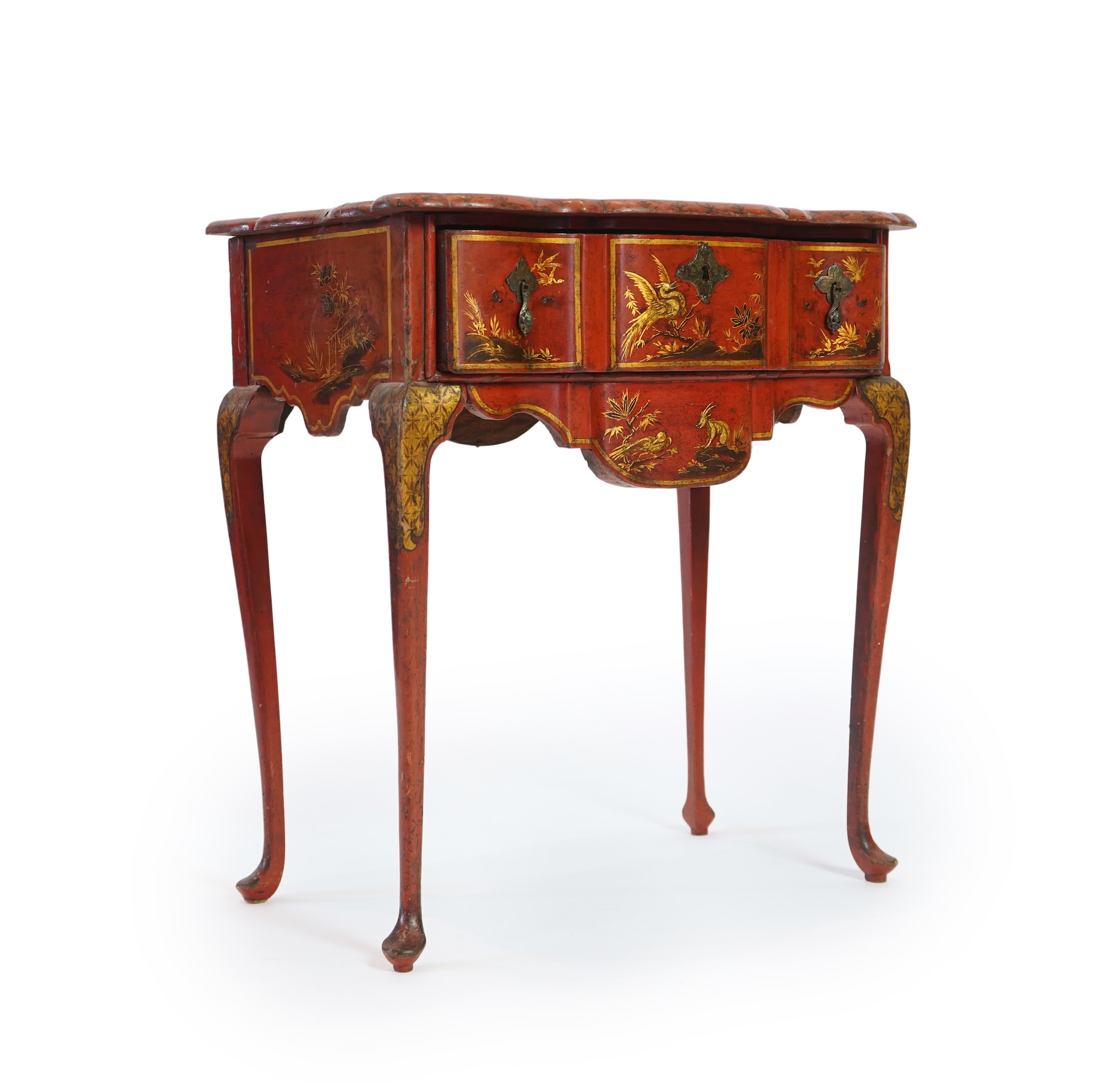 An early 18th century scarlet japanned lowboy